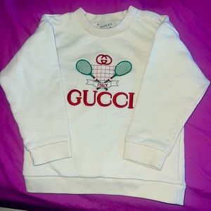 I’m selling my son Gucci sweater for $100 worn once